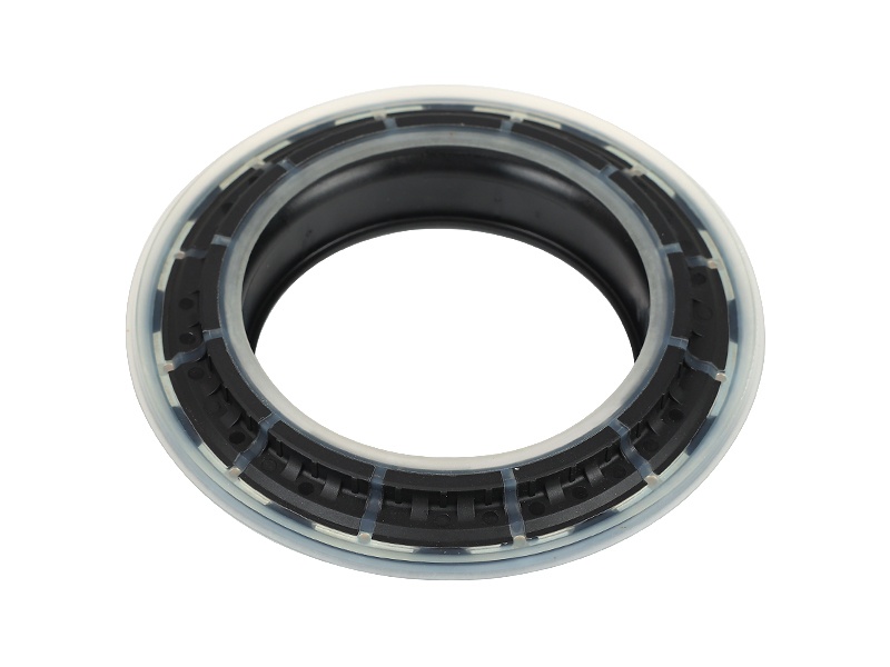 Shock absorber bearing lower cover with embedded iron parts and TPU rubber coating